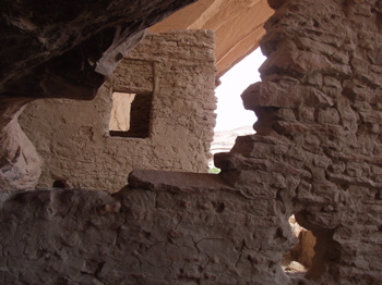 Looking thorugh the window and collapsing River House Ruin on the San Juan River